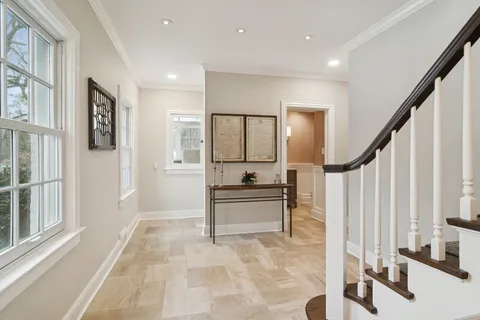 a view of a living room with a large window