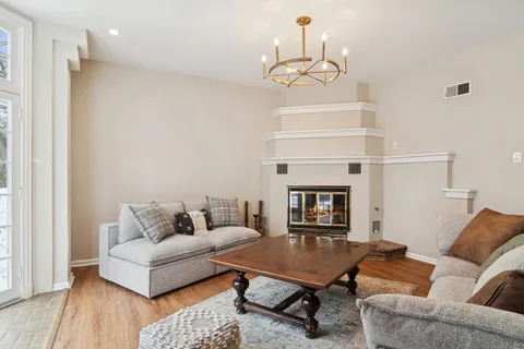 a view of a livingroom with furniture and window