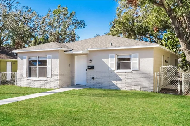 front view of a house with a yard