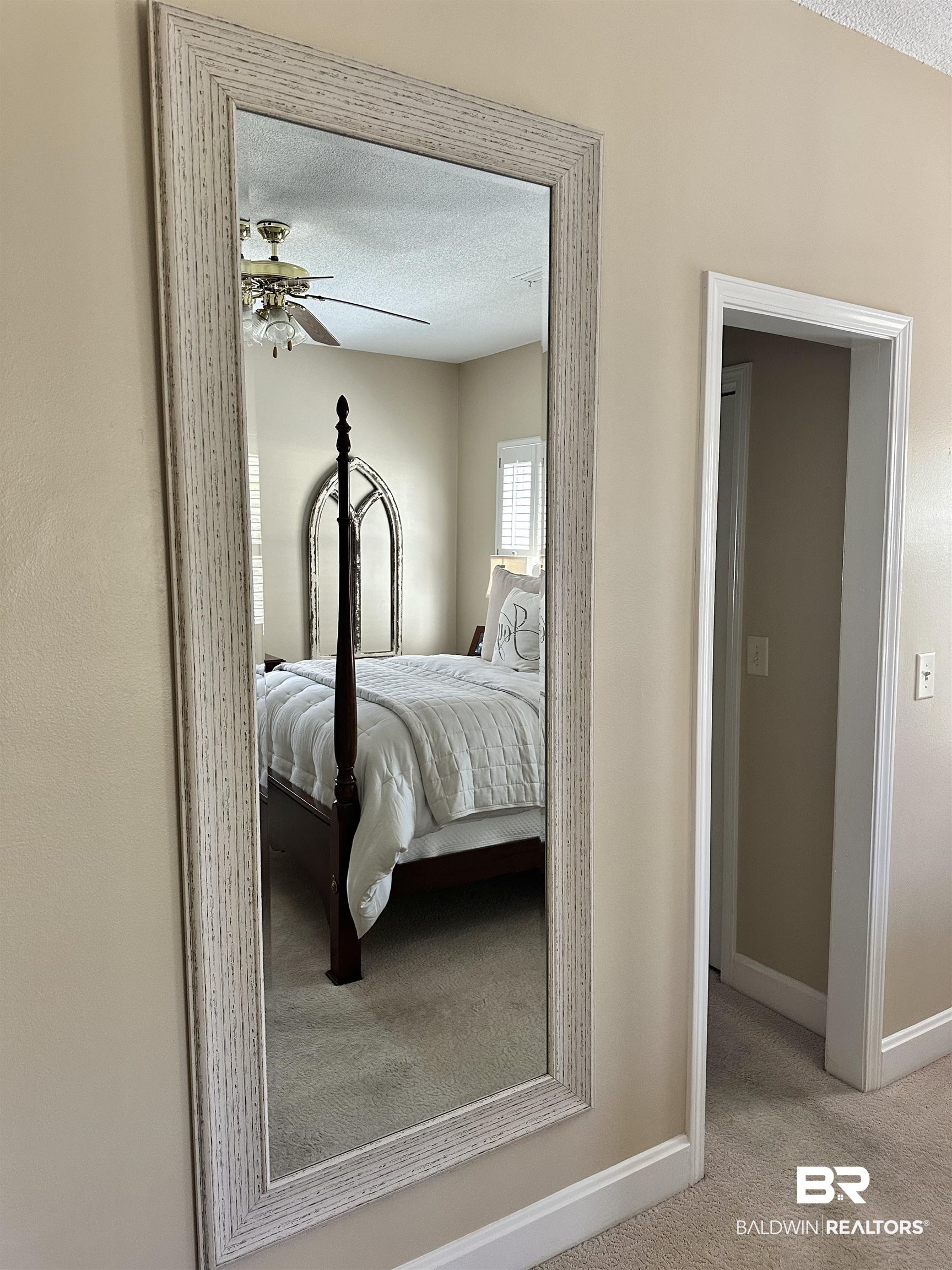 148 Brooks Boulevard Brewton, AL 36426 - Photo 19 of 45 Bedroom with baseboards, carpet floors, a textured ceiling, and ceiling fan