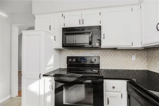 $270,000 | 321 Southeast Greystone Drive, Lee's Summit, MO 64063