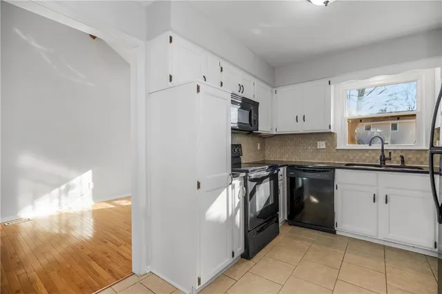 $270,000 | 321 Southeast Greystone Drive, Lee's Summit, MO 64063