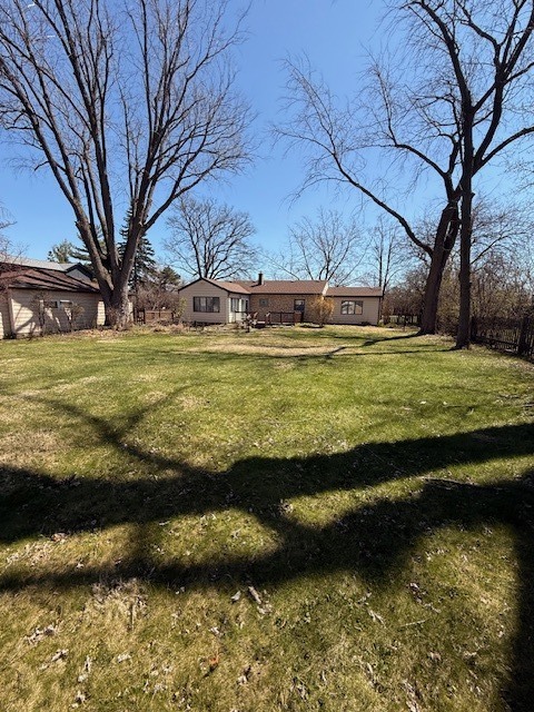 1018 West Plainfield Road Countryside, IL 60525 - Photo 16 of 17 a view of a large body of water with a building in the background