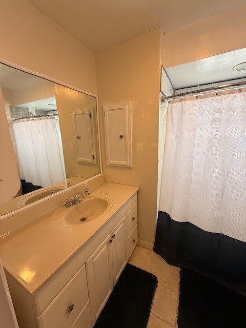 1018 West Plainfield Road Countryside, IL 60525 - Photo 9 of 17 a bathroom with a sink and a mirror
