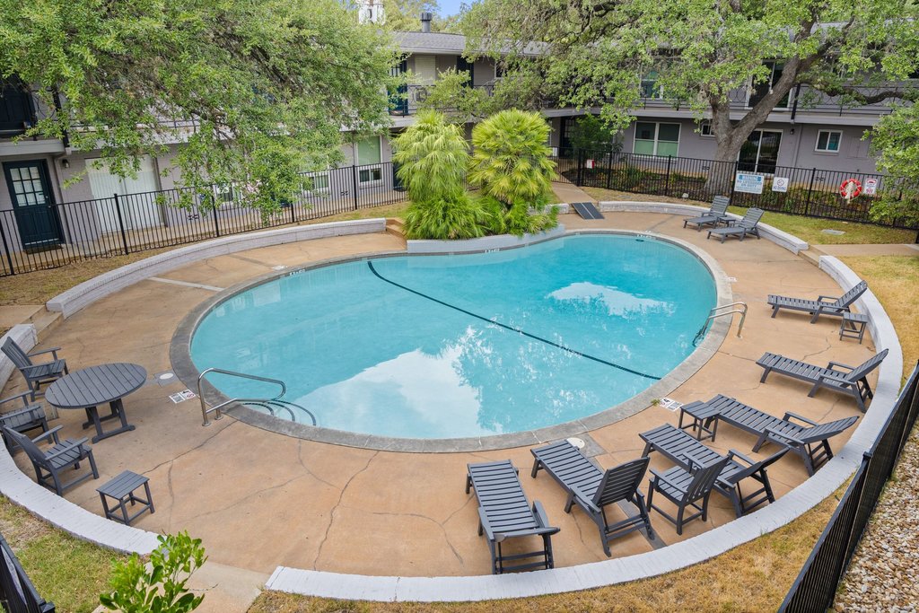 1210 Windsor Road, Unit 209 Austin, TX 78703 - Photo 25 of 38 The refreshing pool is located just outside your front door!