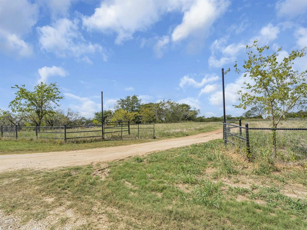 7281 Mesquite Ridge Sanger, TX 76266 - Photo 2 of 13 a view of a lake