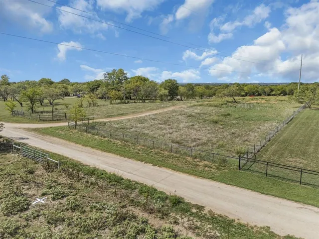 a view of lake with green space