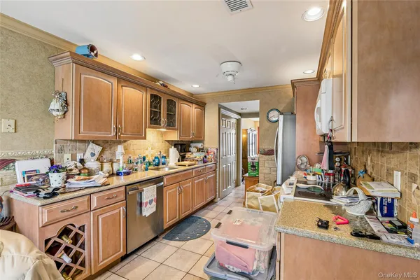 $699,999 | 157 Hidden Ponds Circle, Smithtown, NY 11787