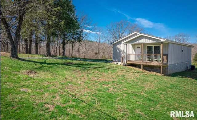 $225,000 | 490 Beech Hollow Road, Harrisburg, IL 62946