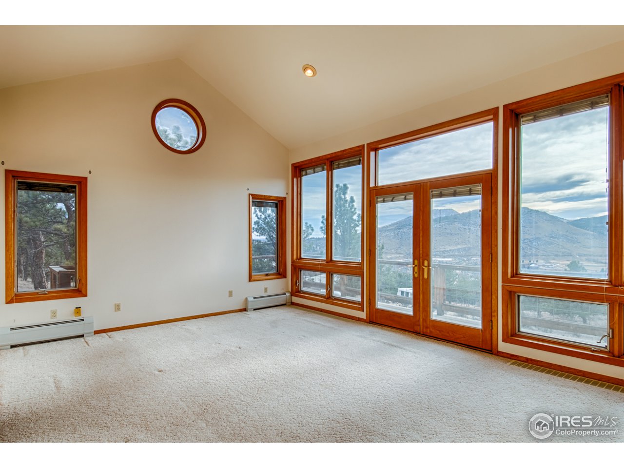 601 Eagle Ridge Road Longmont, CO 80503 - Photo 11 of 40 a view of an empty room with a window