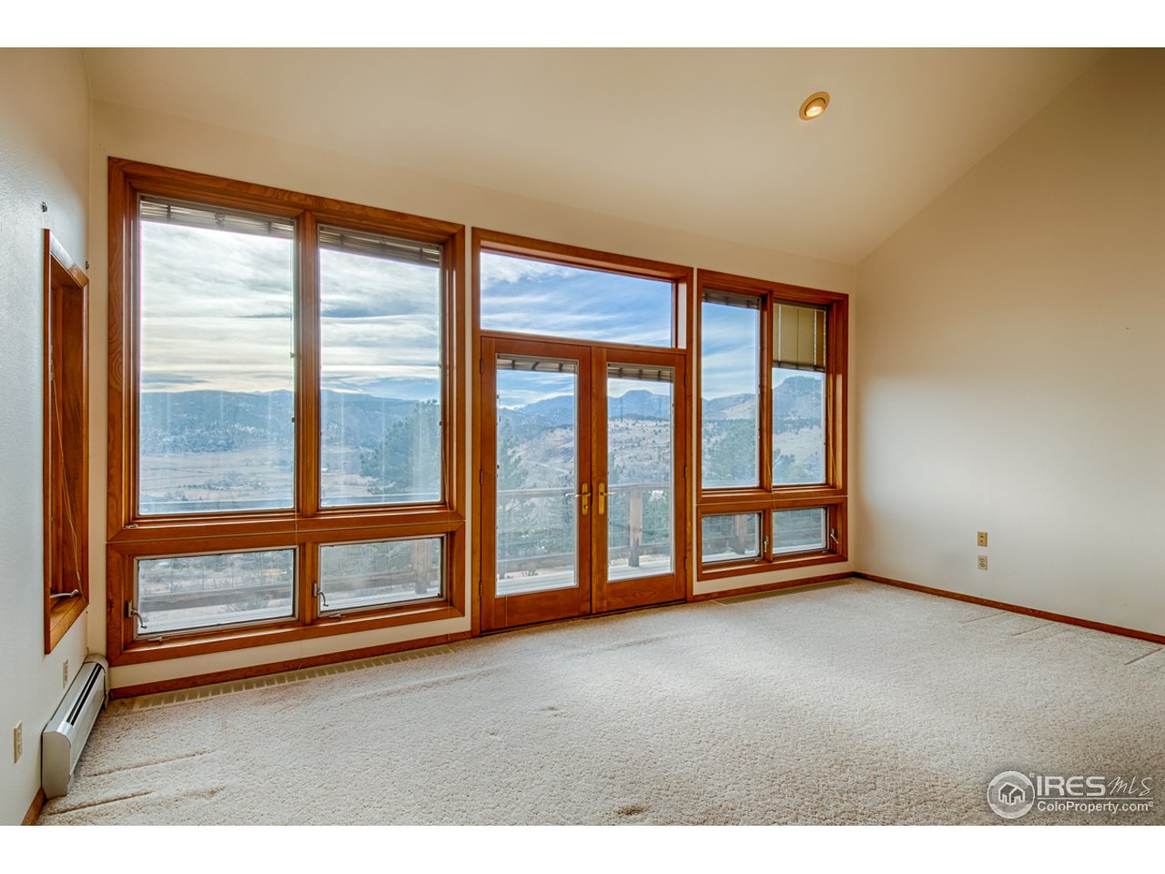 601 Eagle Ridge Road Longmont, CO 80503 - Photo 12 of 40 a view of an empty room with a window