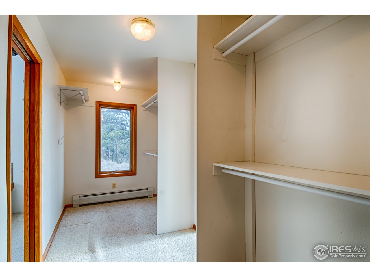 601 Eagle Ridge Road Longmont, CO 80503 - Photo 16 of 40 a view of an empty room with a window
