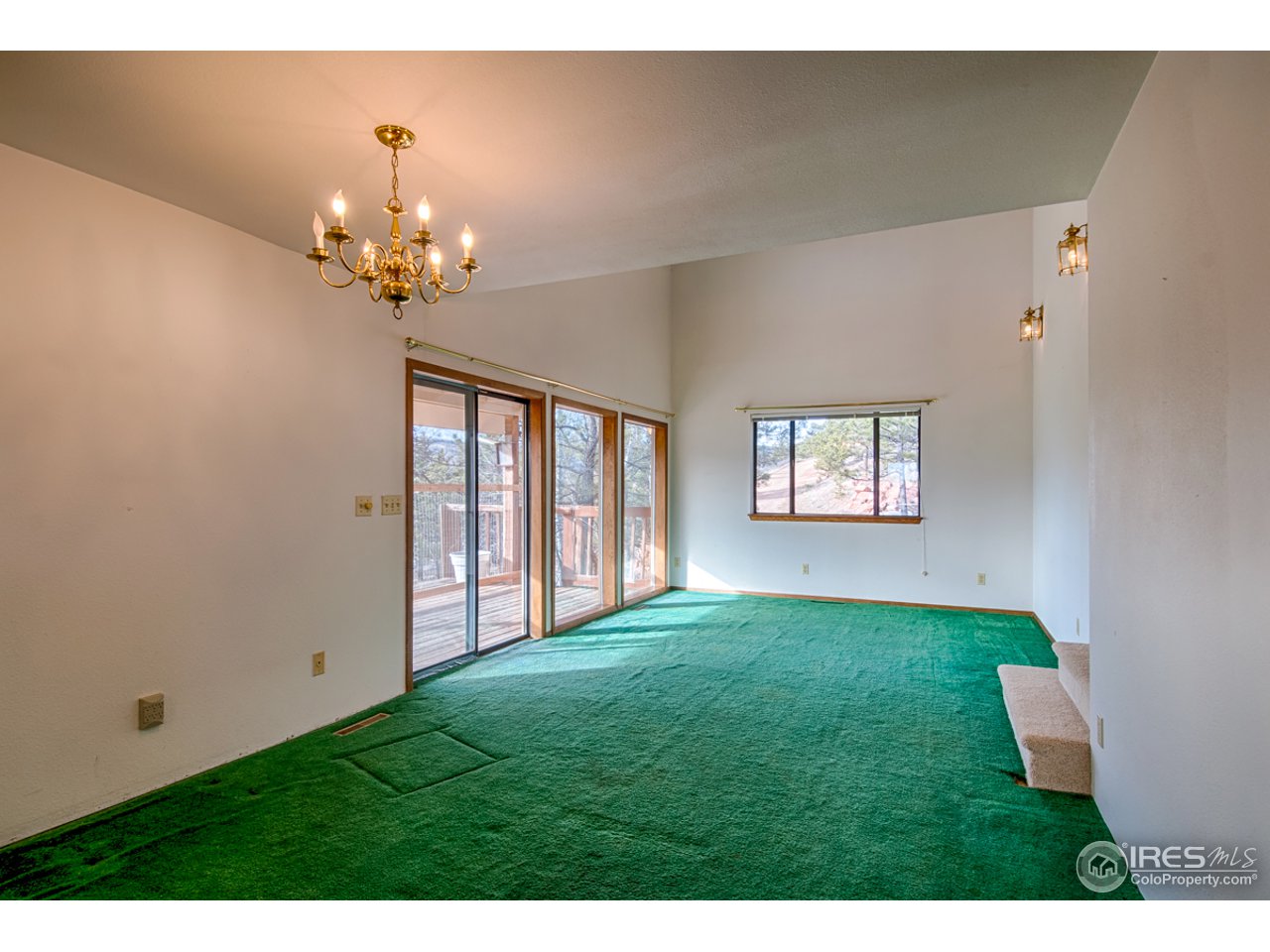 601 Eagle Ridge Road Longmont, CO 80503 - Photo 17 of 40 a view of an empty room with a window