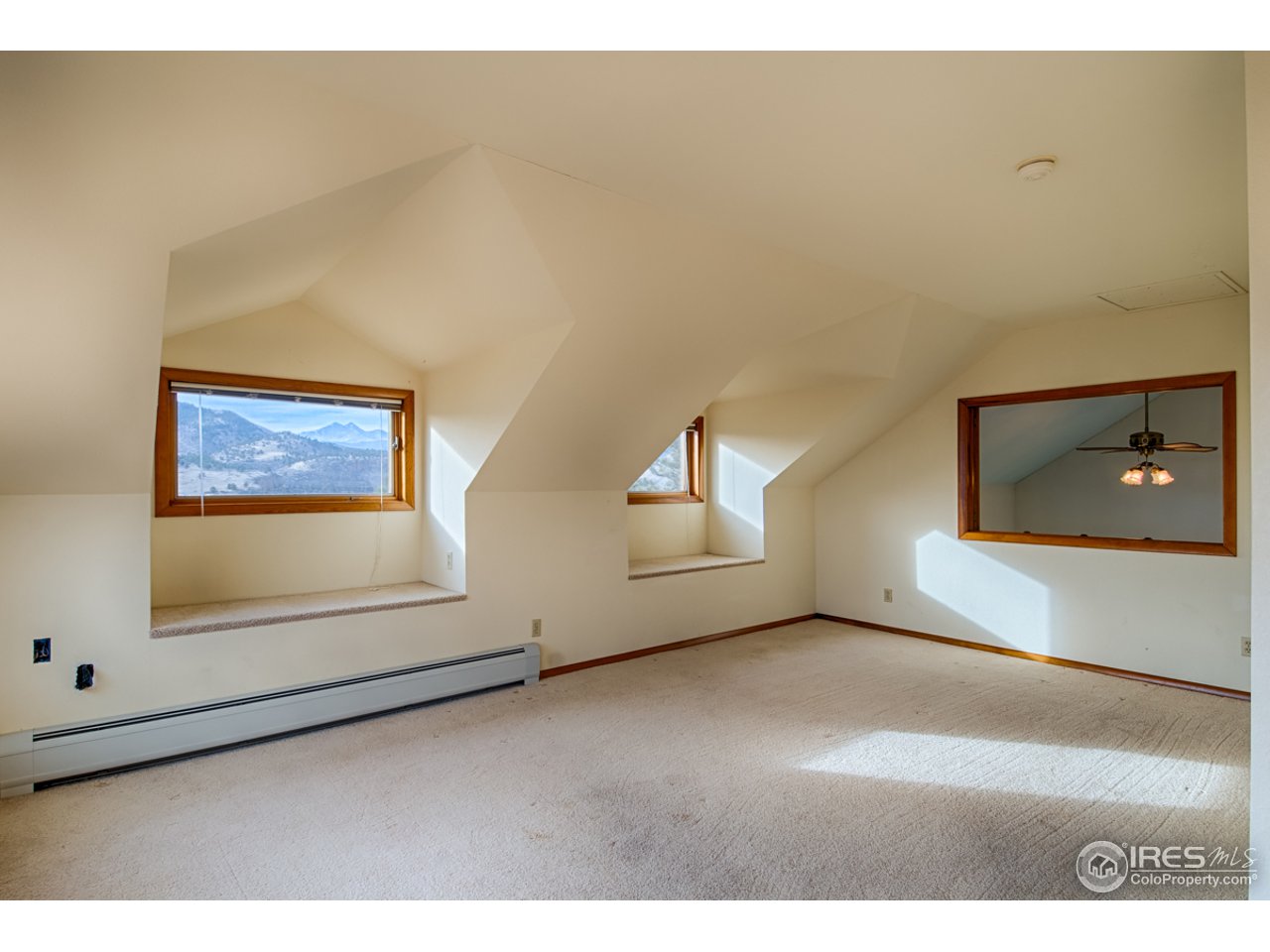 601 Eagle Ridge Road Longmont, CO 80503 - Photo 29 of 40 a view of an empty room and window