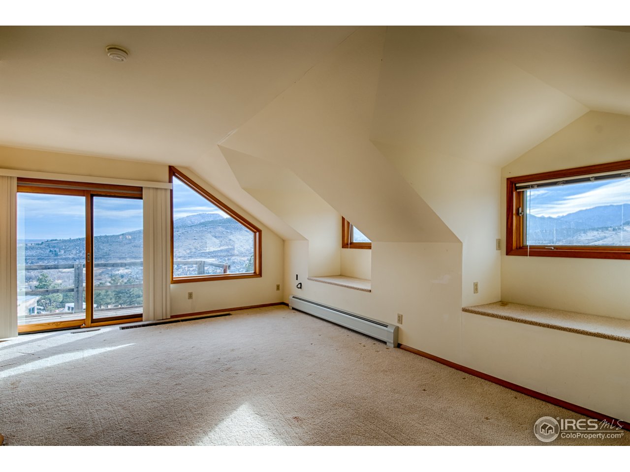 601 Eagle Ridge Road Longmont, CO 80503 - Photo 30 of 40 a view of an empty room with a window