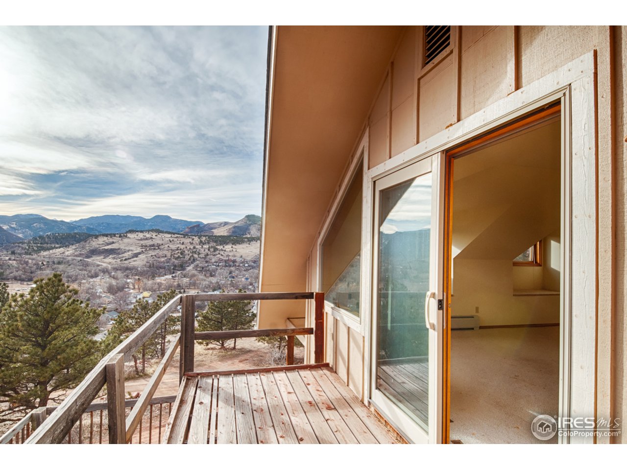 601 Eagle Ridge Road Longmont, CO 80503 - Photo 33 of 40 a view of balcony with two chairs