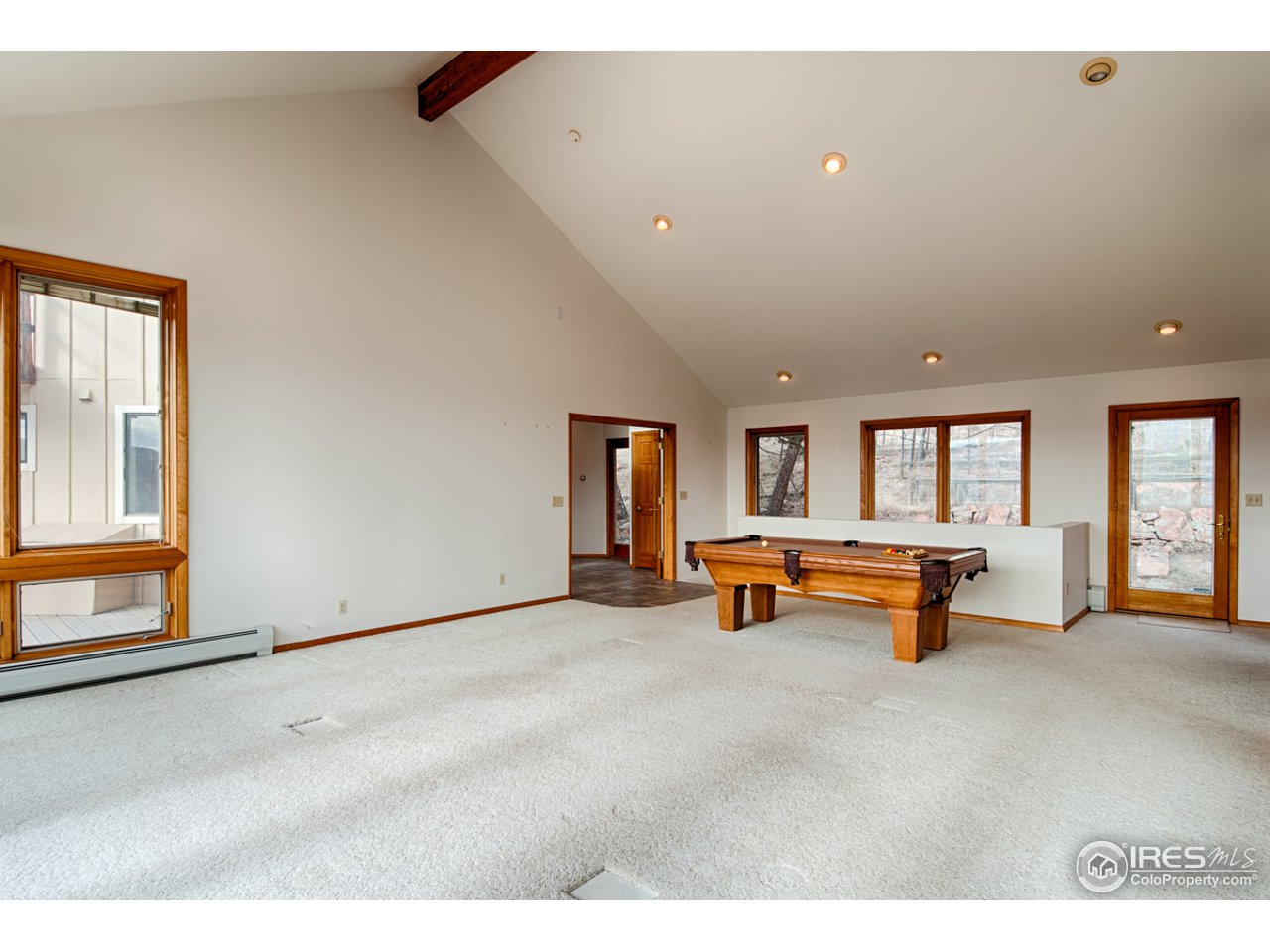 601 Eagle Ridge Road Longmont, CO 80503 - Photo 10 of 40 a backyard of a house with table and chairs
