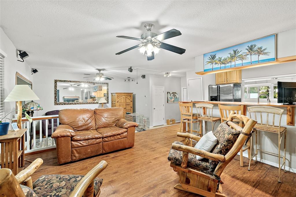 405 North Cherry Street Bunnell, FL 32110 - Photo 15 of 52 a living room with furniture and a large window