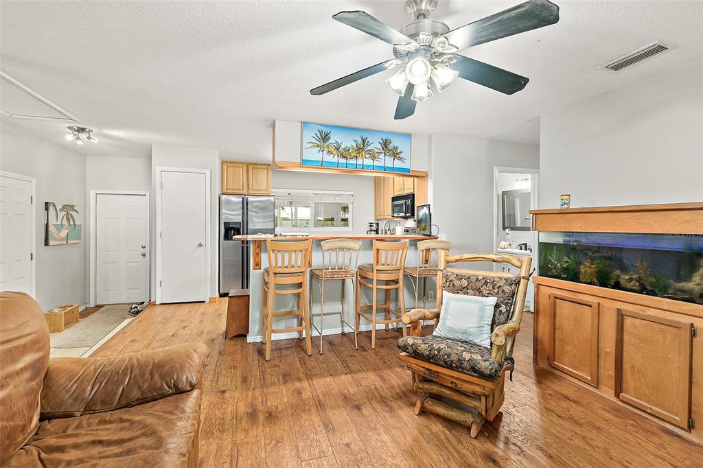 405 North Cherry Street Bunnell, FL 32110 - Photo 17 of 52 a living room with furniture and a fireplace