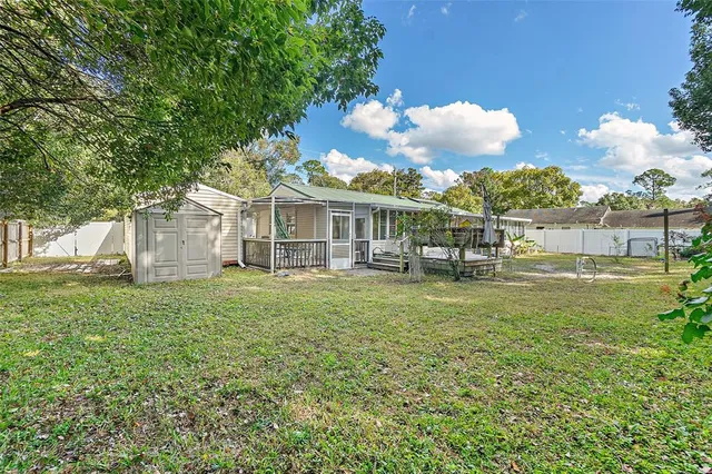 a view of backyard with green space