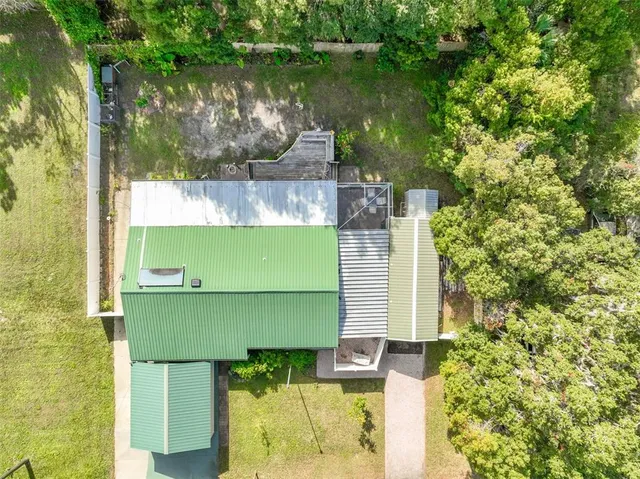 a balcony with table and chairs