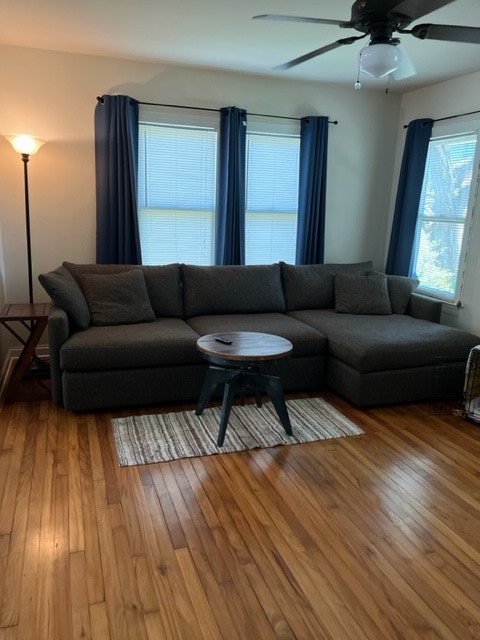 Undisclosed Address Austin, TX 78704 - Photo 8 of 10 a living room with furniture and a wooden floor