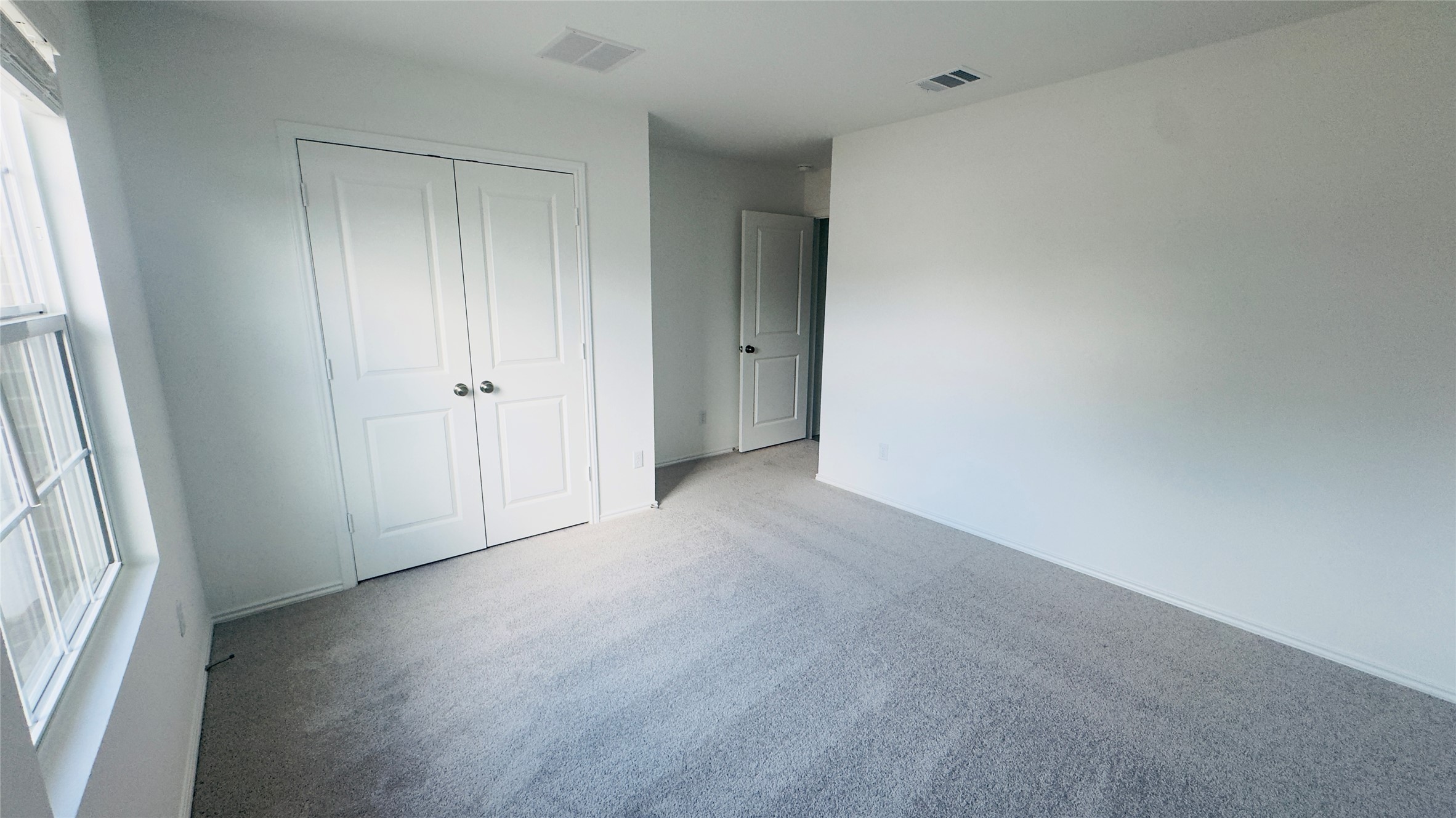 1541 Boggy Crk Rnch Road Georgetown, TX 78628 - Photo 16 of 30 Unfurnished bedroom with carpet and a closet
