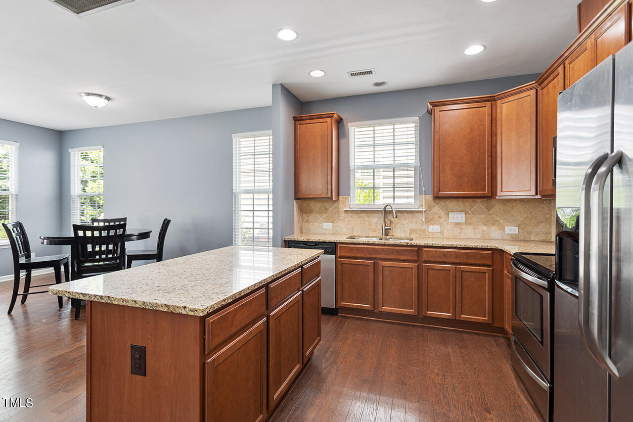 942 Ileagnes Road Raleigh, NC 27603 - Photo 13 of 24 Large and Spacious Kitchen Island