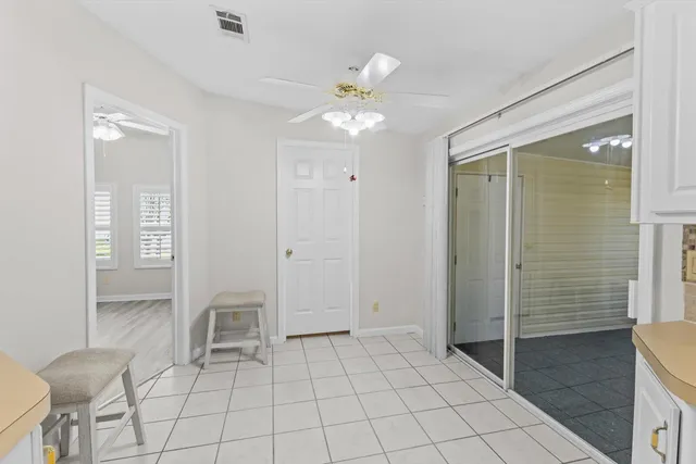 a bathroom with a sink double vanity and a mirror
