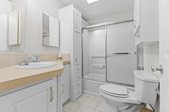 a view of an empty room with a sliding door