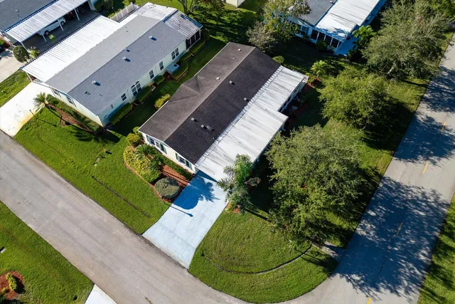 a view of a chairs and table in the patio