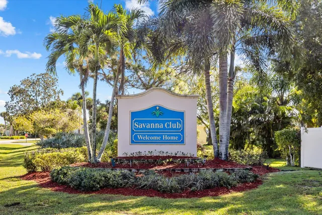 a view of a yard pool outdoor seating and nature