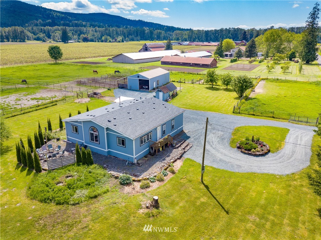 4165 Deming Road Everson, WA 98247 - Photo 1 of 31 a view of an ocean with a swimming pool