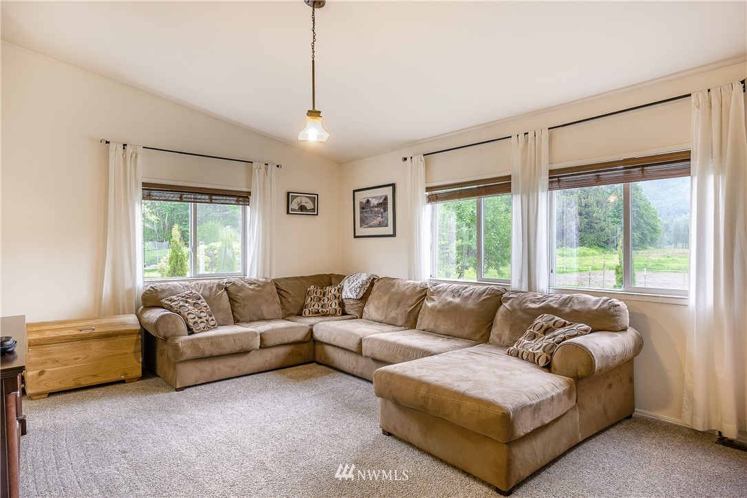 4165 Deming Road Everson, WA 98247 - Photo 14 of 31 a living room with furniture and a large window