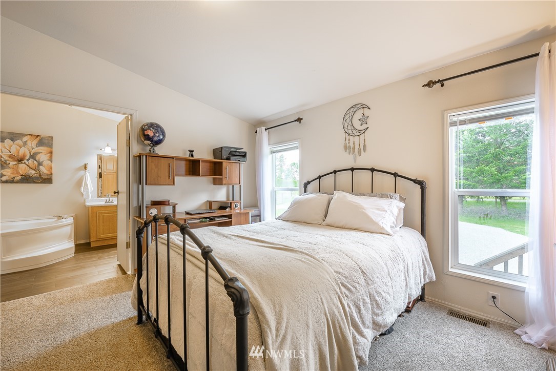 4165 Deming Road Everson, WA 98247 - Photo 16 of 31 a bedroom with a bed and a large window