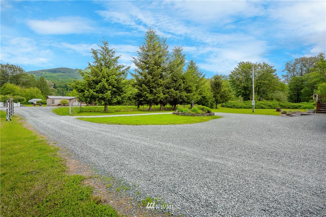 4165 Deming Road Everson, WA 98247 - Photo 25 of 31 a view of field with tall trees