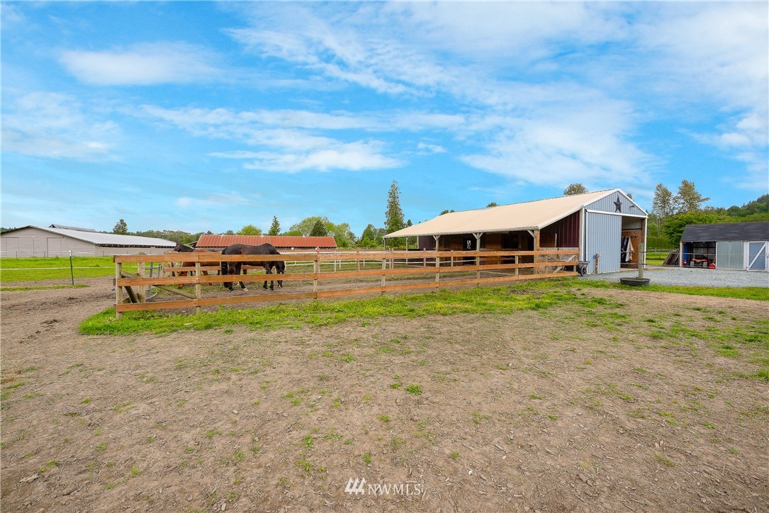 4165 Deming Road Everson, WA 98247 - Photo 26 of 31 a view of a house with a yard