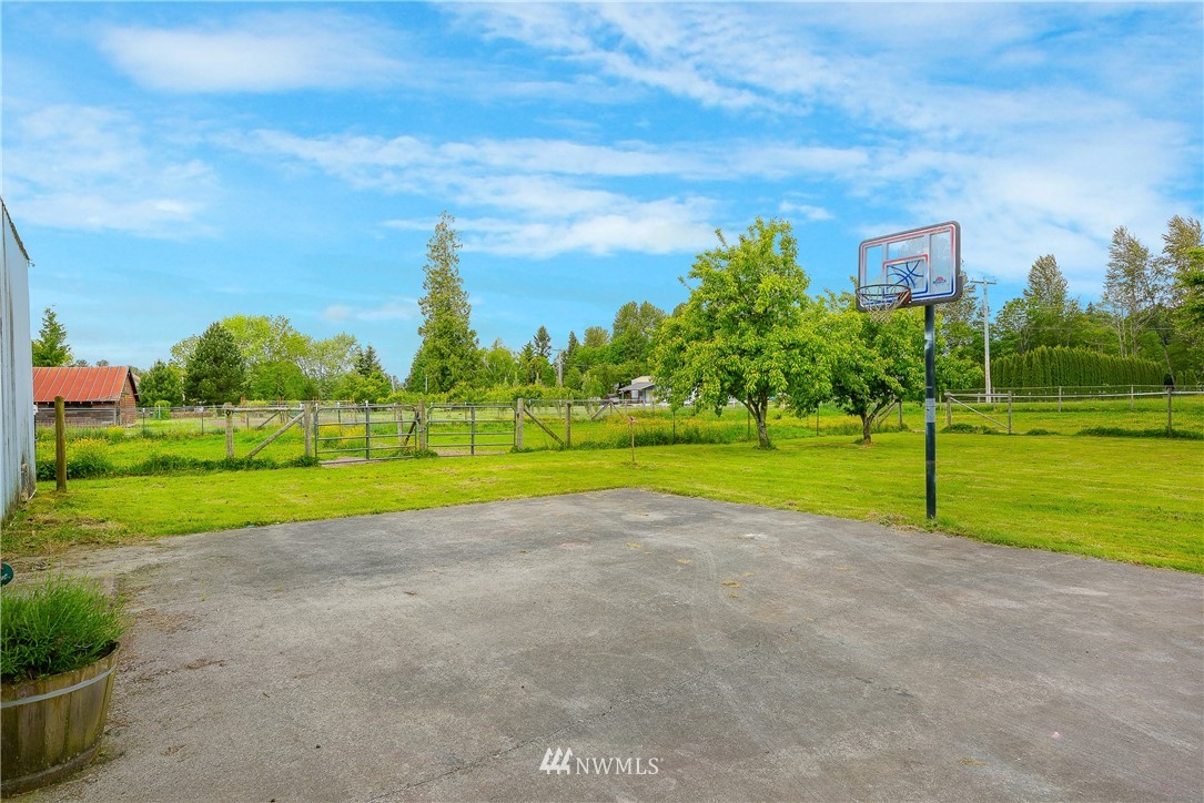 4165 Deming Road Everson, WA 98247 - Photo 4 of 31 a view of a golf course with a lake