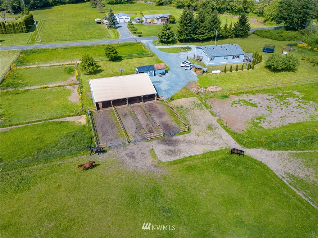 4165 Deming Road Everson, WA 98247 - Photo 31 of 31 an aerial view of a house with a garden