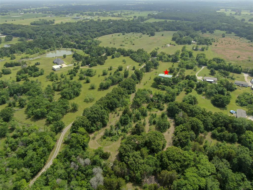 10476 County Road 313 Terrell, TX 75161 - Photo 40 of 40 an aerial view of a houses with a yard