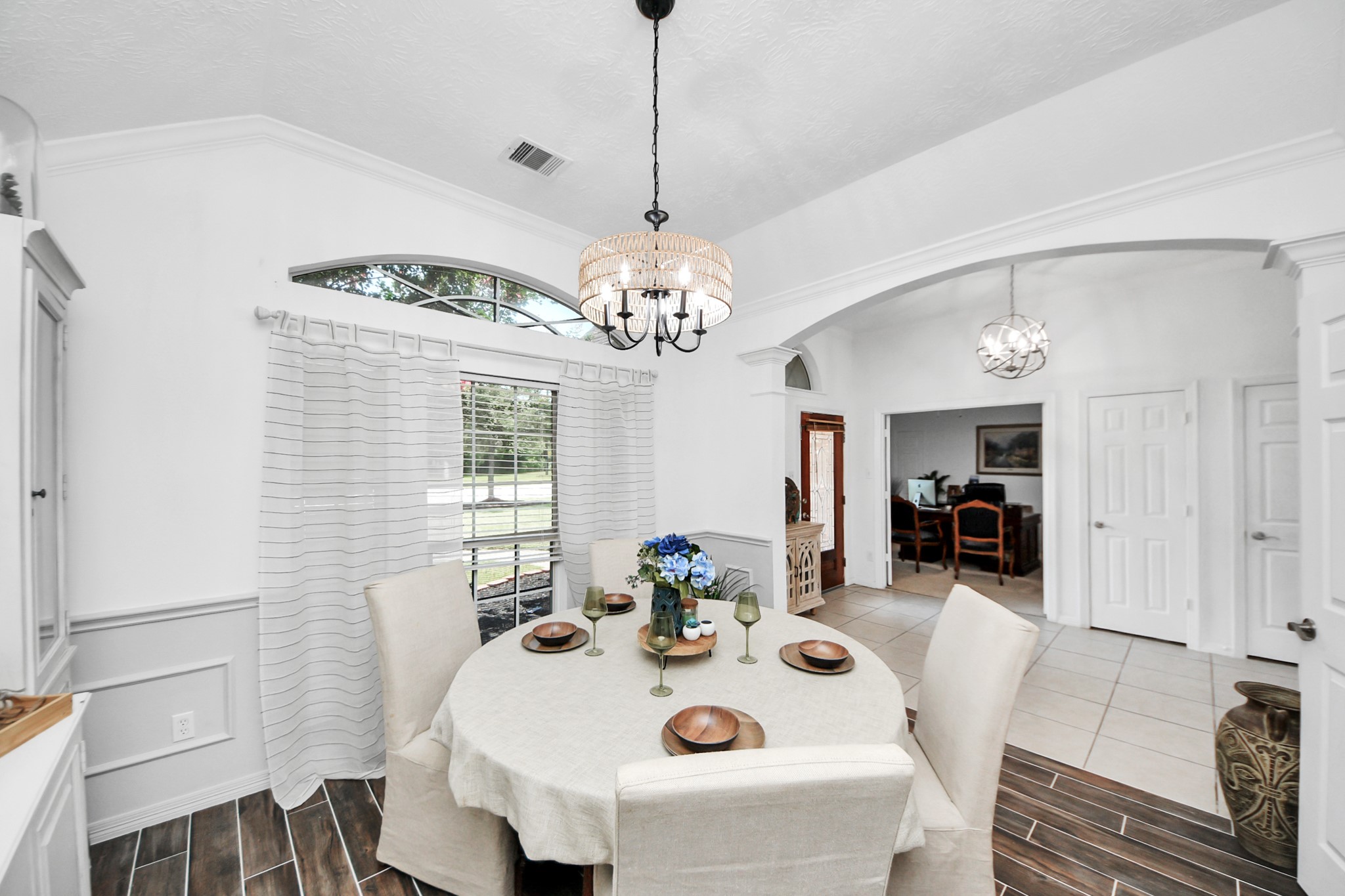 5231 South Fm 565 Rd Cove Cove, TX 77523 - Photo 14 of 50 a very nice looking dining room with a table and chairs