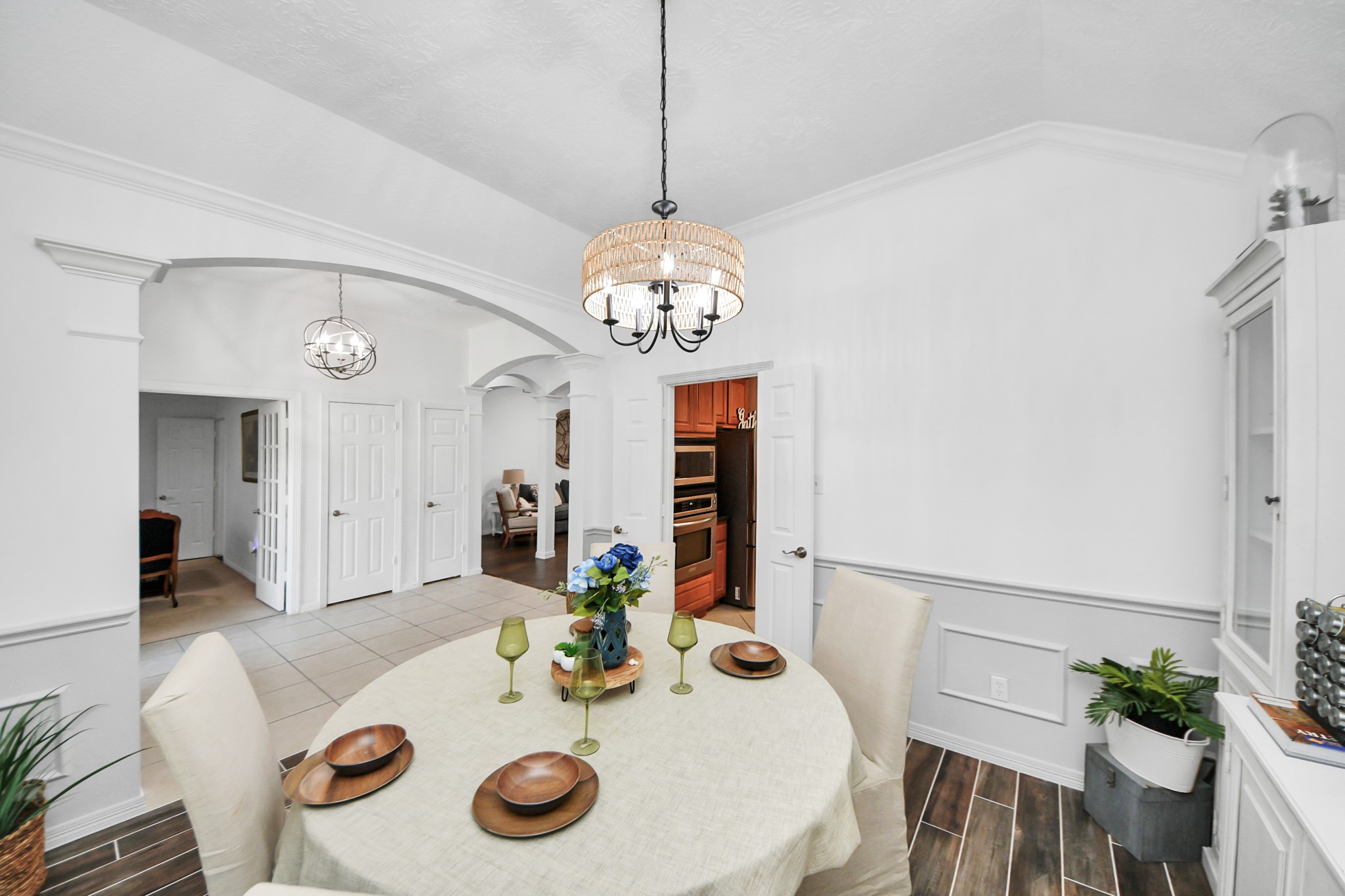 5231 South Fm 565 Rd Cove Cove, TX 77523 - Photo 15 of 50 a view of a dining room with furniture and chandelier