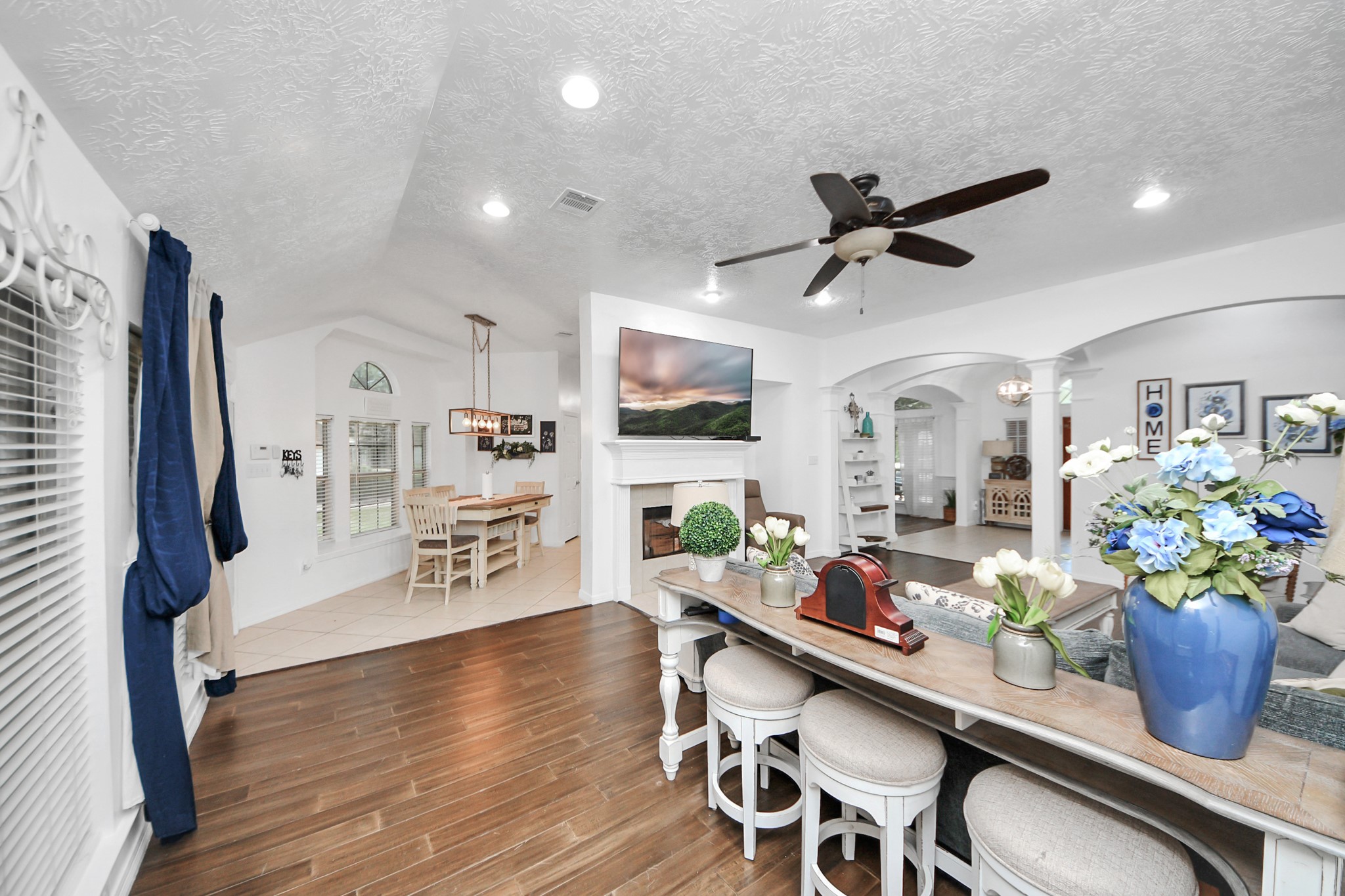 5231 South Fm 565 Rd Cove Cove, TX 77523 - Photo 22 of 50 a living room with furniture and a wooden floor