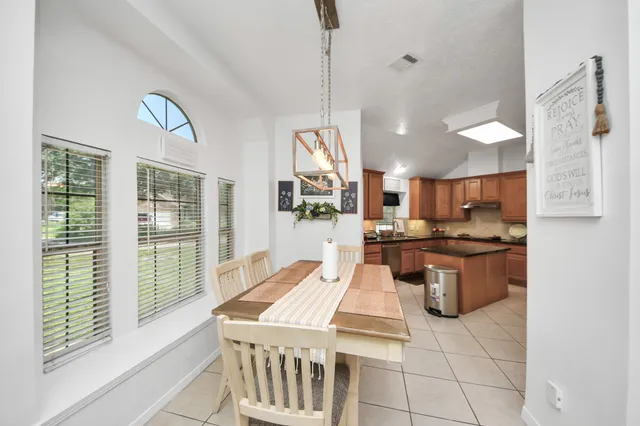 a view of a dining room with furniture