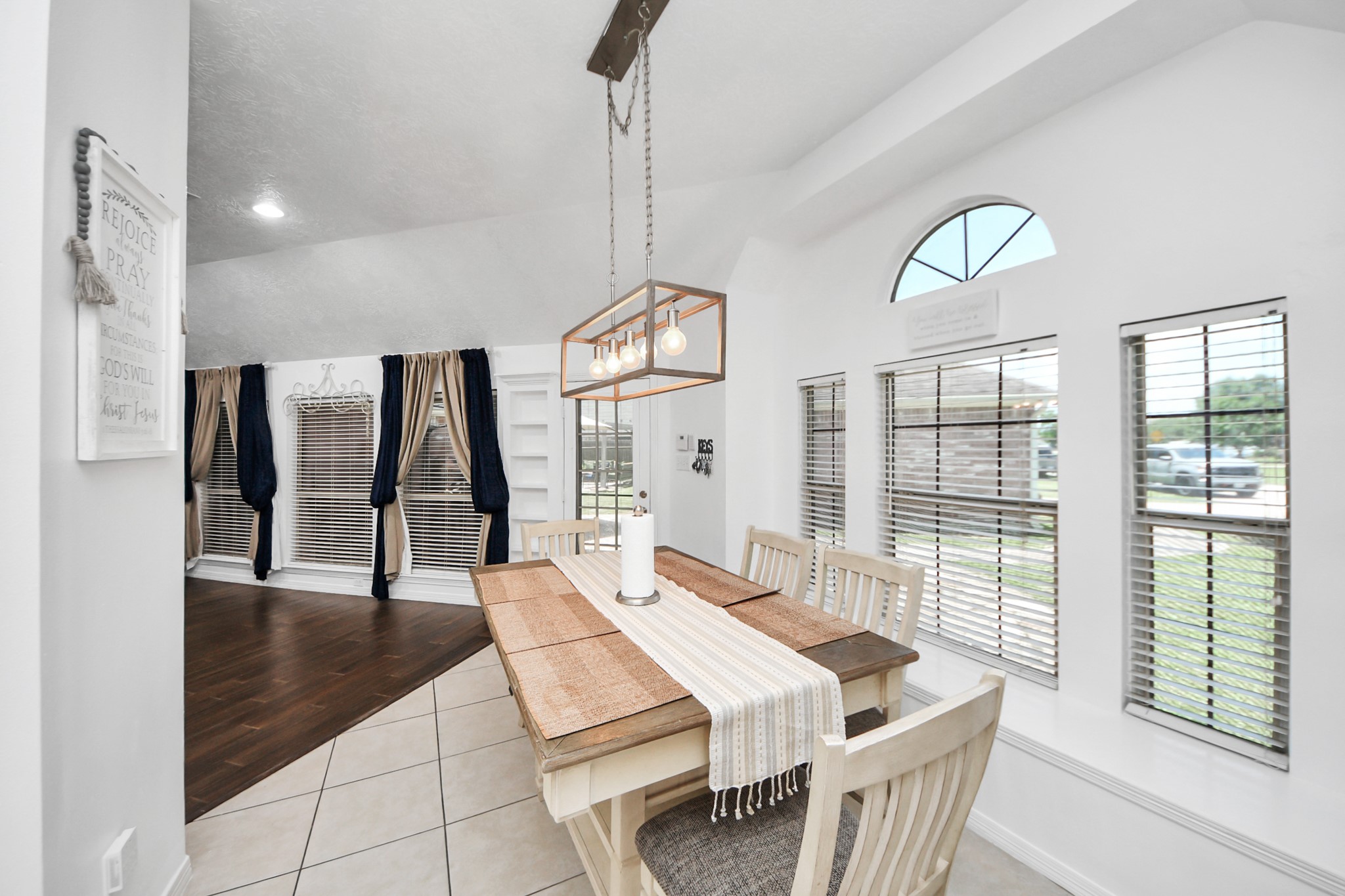 5231 South Fm 565 Rd Cove Cove, TX 77523 - Photo 33 of 50 a living room with couches a coffee table and a large window with outer view