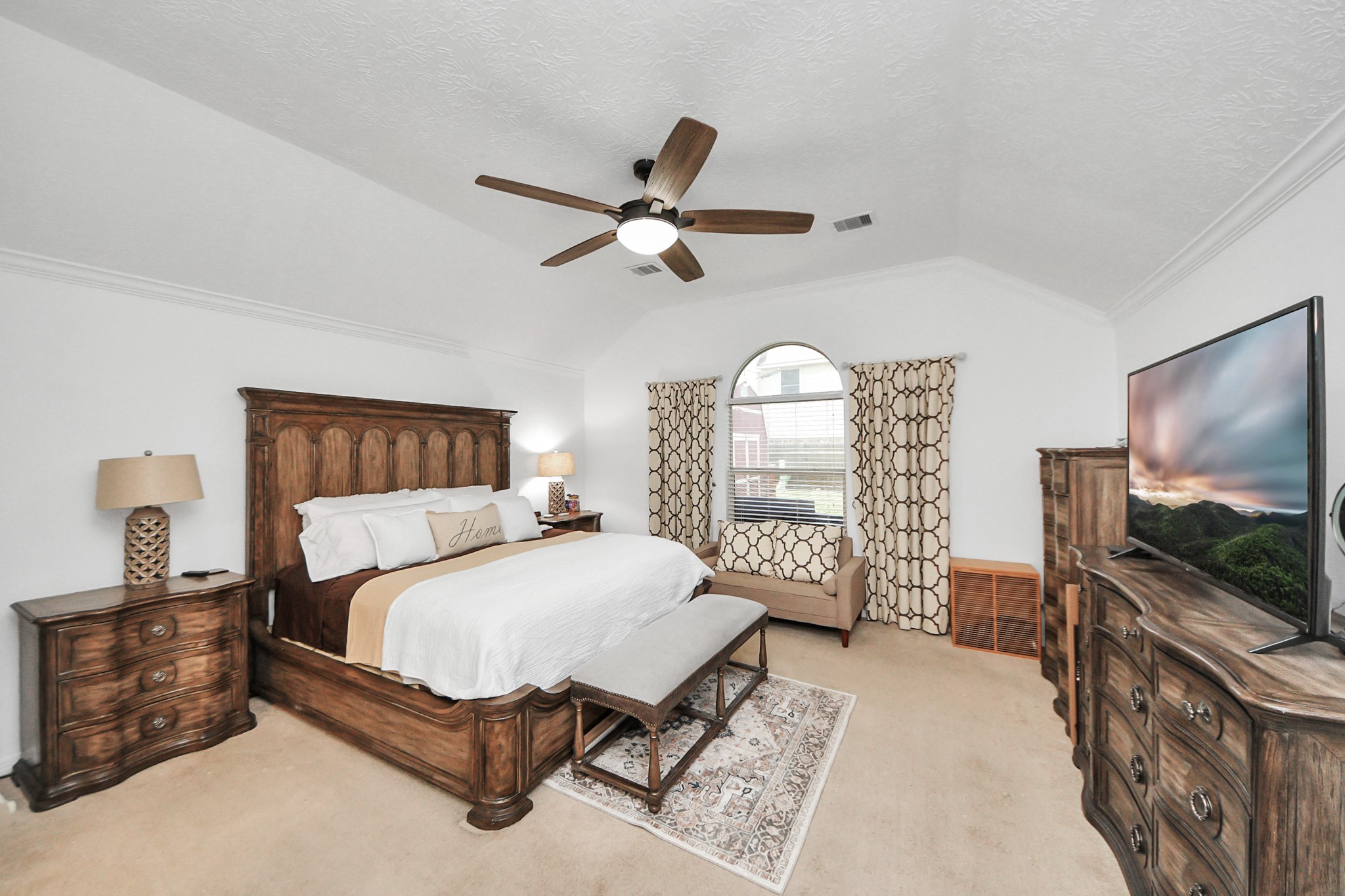 5231 South Fm 565 Rd Cove Cove, TX 77523 - Photo 39 of 50 a bedroom with a bed and a flat screen tv