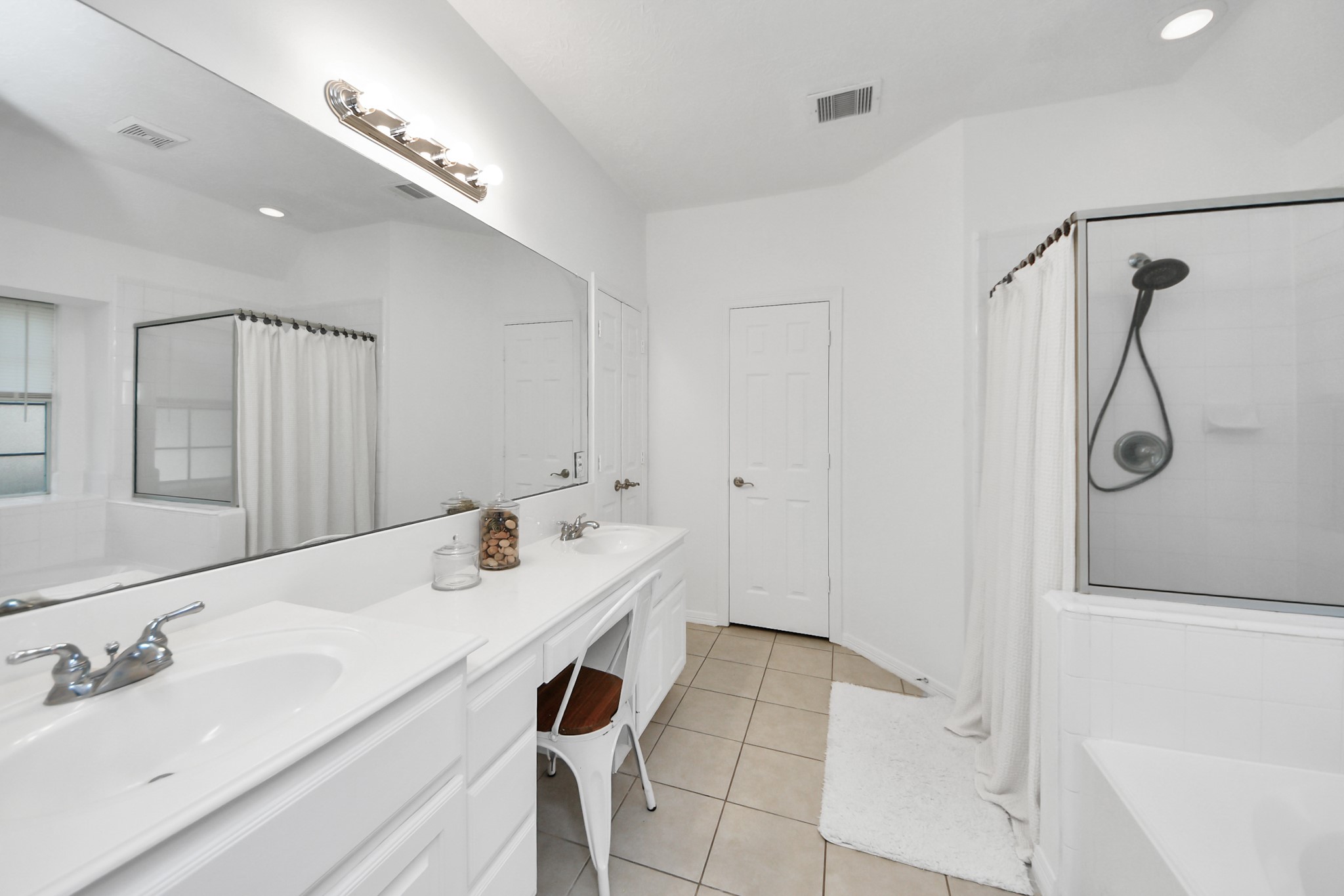 5231 South Fm 565 Rd Cove Cove, TX 77523 - Photo 43 of 50 a bathroom with a sink and a mirror