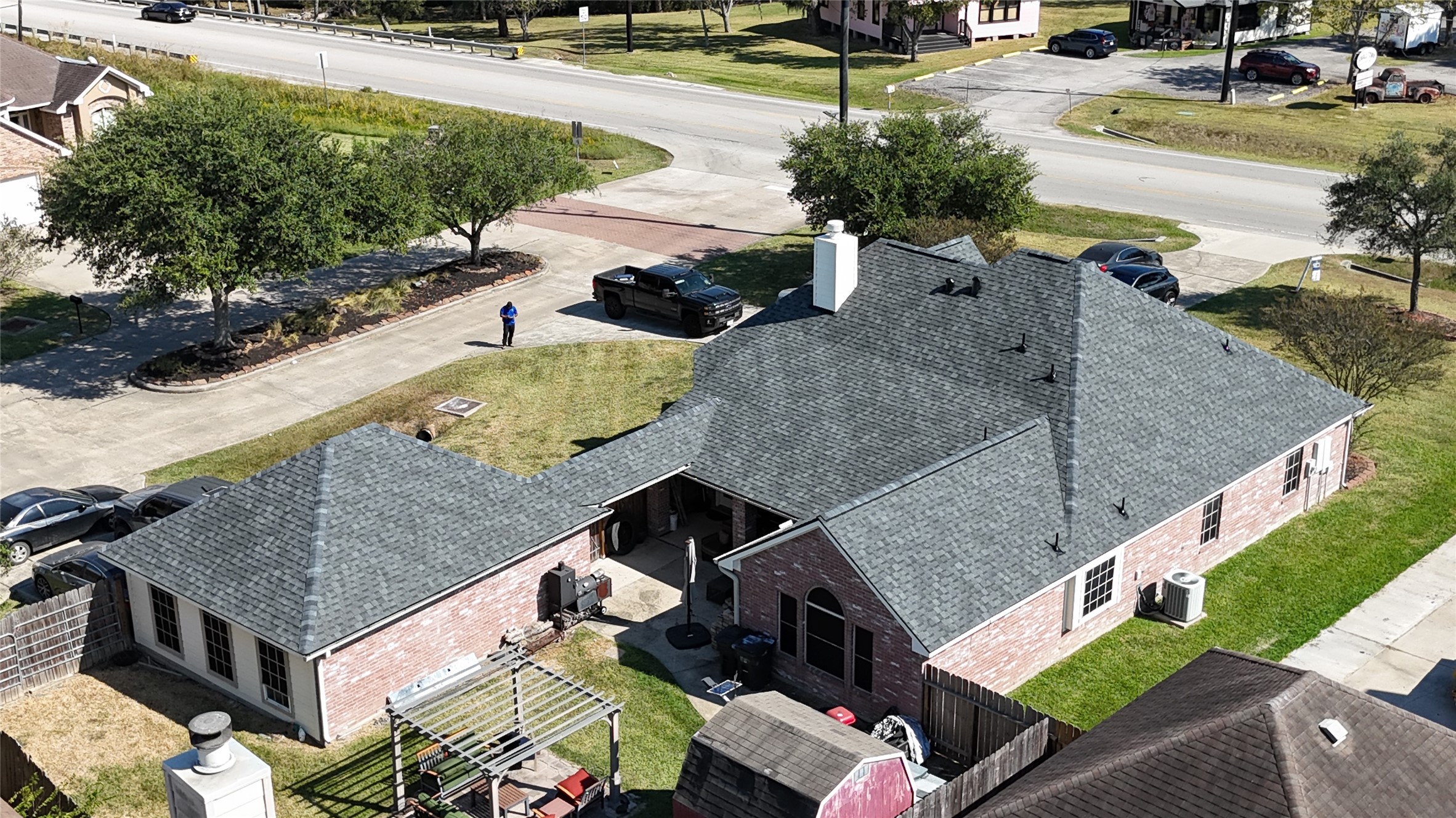 5231 South Fm 565 Rd Cove Cove, TX 77523 - Photo 5 of 50 an aerial view of a house with swimming pool and patio