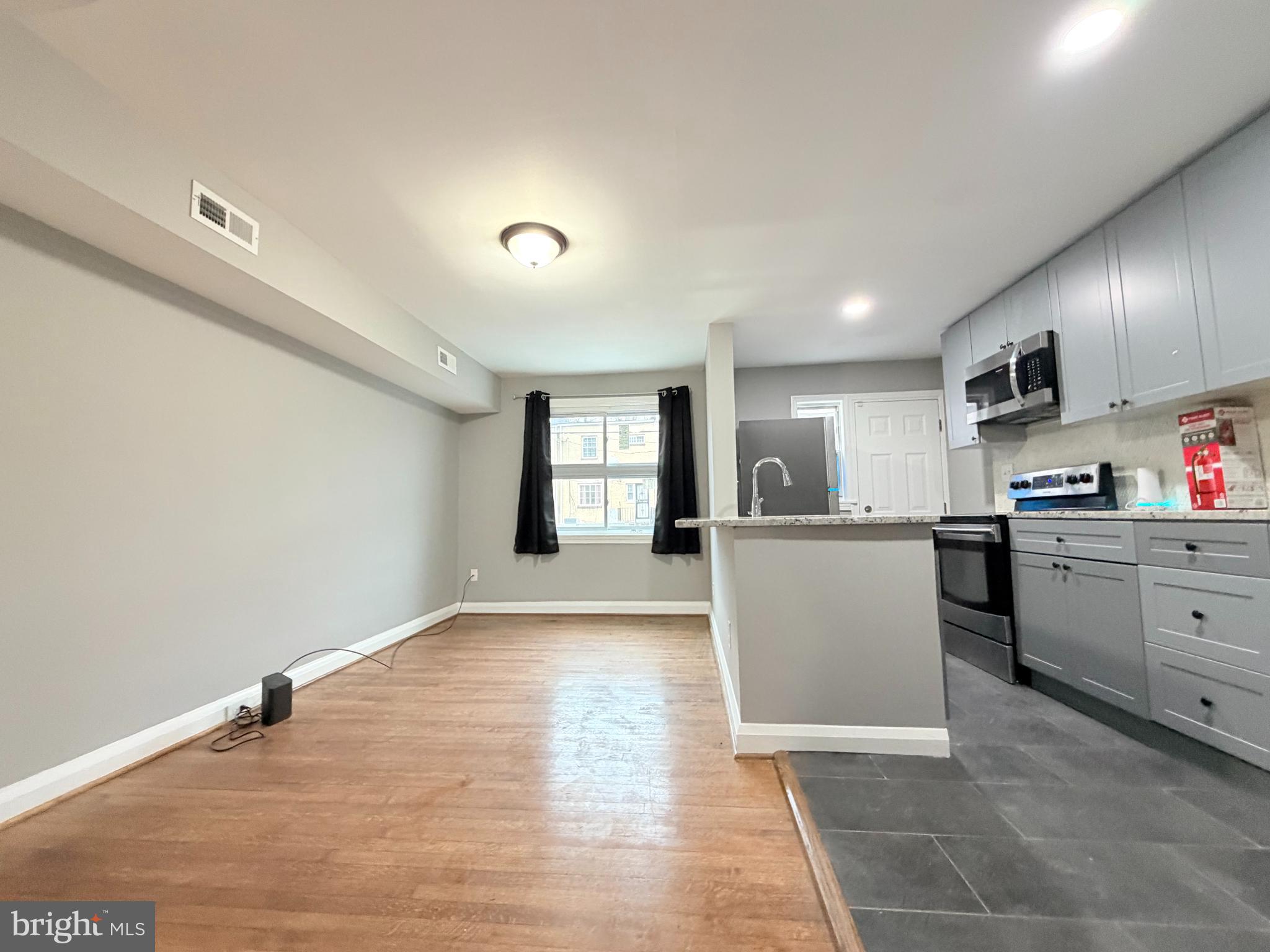 5115 Pembridge Avenue Baltimore, MD 21215 - Photo 6 of 29 a view of kitchen with sink and cabinets