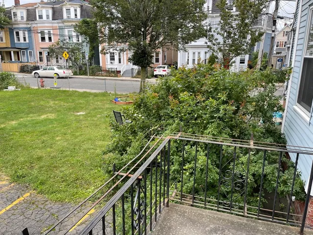 a view of building with yard